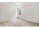 Well-lit bedroom with carpet flooring and a window at 326 Barn Owl Way, Conway, SC 29527