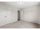 Bright bedroom featuring neutral walls, carpet, and double-door closet at 326 Barn Owl Way, Conway, SC 29527