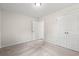Bright bedroom with neutral walls, carpet, and double-door closet at 326 Barn Owl Way, Conway, SC 29527
