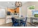 Bright kitchen features a breakfast nook, modern appliances, and wood cabinets at 4541 Girvan Dr. # 27-D, Myrtle Beach, SC 29579