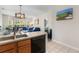 Kitchen with stainless steel appliances and a view into the living area at 4541 Girvan Dr. # 27-D, Myrtle Beach, SC 29579