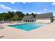 Refreshing community pool with lounge chairs and cabanas at 4541 Girvan Dr. # 27-D, Myrtle Beach, SC 29579