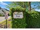 Turnberry Park community entrance sign with lush greenery at 4541 Girvan Dr. # 27-D, Myrtle Beach, SC 29579