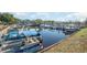 Community marina with numerous boats docked along a calm waterway at 322 Barn Owl Way, Conway, SC 29527