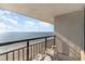 Balcony view of ocean, beach, and sand under a bright sunny sky at 1501 S Ocean Blvd. # 1040, Myrtle Beach, SC 29577