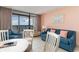 Oceanfront living room with seating and dining areas at 1501 S Ocean Blvd. # 1040, Myrtle Beach, SC 29577