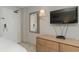 Bedroom with dresser, TV, and mirror at 1501 S Ocean Blvd. # 1040, Myrtle Beach, SC 29577