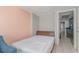Small bedroom with a full-size bed and adjacent kitchen at 1501 S Ocean Blvd. # 1040, Myrtle Beach, SC 29577