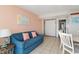Living room with sofa and dining table at 1501 S Ocean Blvd. # 1040, Myrtle Beach, SC 29577