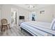 Bedroom with a queen bed, a chair, and view to the kitchen and other rooms at 405 N 30Th Ave. N, North Myrtle Beach, SC 29582