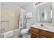 Bathroom with tub, shower, toilet and vanity with sink at 405 N 30Th Ave. N, North Myrtle Beach, SC 29582