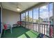Relaxing screened porch with seating and view of the neighborhood at 405 N 30Th Ave. N, North Myrtle Beach, SC 29582