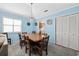 Dining area features a wood table and chairs, plus access to kitchen and other rooms at 405 N 30Th Ave. N, North Myrtle Beach, SC 29582