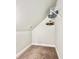 Small attic closet with wire shelving and hanging rod at 230 Mint Ct., Little River, SC 29566