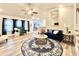 Open living room with a navy couch and a large area rug at 230 Mint Ct., Little River, SC 29566