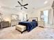 Spacious main bedroom with plush carpeting and ample natural light at 230 Mint Ct., Little River, SC 29566