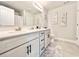 Clean bathroom with double vanity and neutral tones at 230 Mint Ct., Little River, SC 29566