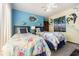 Bright bedroom with twin beds, playful decor, and ocean-themed artwork at 3015 Old Bryan Dr. # 4-8, Myrtle Beach, SC 29577
