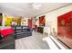 Spacious living area with leather sectional sofa and red accents at 3015 Old Bryan Dr. # 4-8, Myrtle Beach, SC 29577