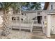Exterior view of a two-story building with wooden decks and staircases at 3015 Old Bryan Dr. # 4-8, Myrtle Beach, SC 29577