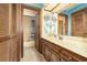 Bathroom with double vanity, tub, and coastal-themed shower curtain at 3015 Old Bryan Dr. # 4-8, Myrtle Beach, SC 29577