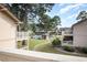 View of community pool and surrounding buildings from a deck at 3015 Old Bryan Dr. # 4-8, Myrtle Beach, SC 29577
