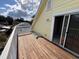 Private deck with access from upper-level bedroom, offering backyard views at 704 43Rd Ave. S, North Myrtle Beach, SC 29582