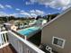 Aerial view showcasing the community pool and surrounding homes at 704 43Rd Ave. S, North Myrtle Beach, SC 29582
