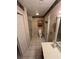 Bathroom features a toilet, shower, and vanity at 704 43Rd Ave. S, North Myrtle Beach, SC 29582