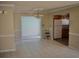 Bright dining room with tile floors and kitchen access at 704 43Rd Ave. S, North Myrtle Beach, SC 29582