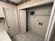 Small laundry area with shelving at 704 43Rd Ave. S, North Myrtle Beach, SC 29582