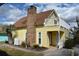 Yellow house with a second story deck at 704 43Rd Ave. S, North Myrtle Beach, SC 29582