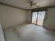 Bedroom with sliding glass doors leading to a balcony at 704 43Rd Ave. S, North Myrtle Beach, SC 29582