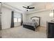 Spacious bedroom with ceiling fan and large windows at 5700 Redgum Dr., Myrtle Beach, SC 29579