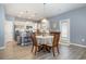 Kitchen dining area with table and chairs, hardwood floors and access to patio at 5700 Redgum Dr., Myrtle Beach, SC 29579