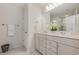 Modern bathroom with double vanity and a large mirror at 5700 Redgum Dr., Myrtle Beach, SC 29579