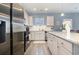 Modern kitchen features stainless steel appliances and granite countertops at 5700 Redgum Dr., Myrtle Beach, SC 29579