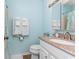 Light blue bathroom with granite vanity and shower/tub combo at 1101 Possum Trot Rd. # C205, North Myrtle Beach, SC 29582