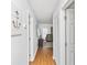 Clean and bright hallway with light wood floors at 1101 Possum Trot Rd. # C205, North Myrtle Beach, SC 29582