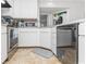 Clean and efficient kitchen with stainless steel appliances and light-colored cabinets at 1101 Possum Trot Rd. # C205, North Myrtle Beach, SC 29582