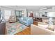 Bright living room with hardwood floors and comfy seating at 1101 Possum Trot Rd. # C205, North Myrtle Beach, SC 29582