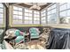 Sunroom with seating area and multiple windows at 1101 Possum Trot Rd. # C205, North Myrtle Beach, SC 29582