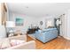 Living room with hardwood floors and plenty of natural light at 1101 Possum Trot Rd. # C205, North Myrtle Beach, SC 29582