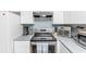 Modern kitchen boasting stainless steel appliances and a spacious layout at 1101 Possum Trot Rd. # C205, North Myrtle Beach, SC 29582