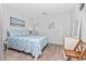 Cozy bedroom with a comfortable bed and beach-inspired decor at 1101 Possum Trot Rd. # C205, North Myrtle Beach, SC 29582