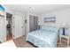 Comfortable bedroom with double bed and ocean-themed decor at 1101 Possum Trot Rd. # C205, North Myrtle Beach, SC 29582