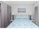 Serene bedroom featuring a double bed and calming wall art at 1101 Possum Trot Rd. # C205, North Myrtle Beach, SC 29582
