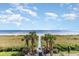 Oceanfront view with walkway to beach and lush landscaping at 4001 S Ocean Blvd. # Apt 2C, North Myrtle Beach, SC 29582