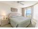 Main bedroom with king bed and ocean view at 4001 S Ocean Blvd. # Apt 2C, North Myrtle Beach, SC 29582