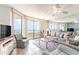 Living room with ocean view and balcony access at 4001 S Ocean Blvd. # Apt 2C, North Myrtle Beach, SC 29582